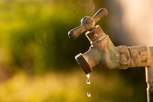 Water leaking from a tap